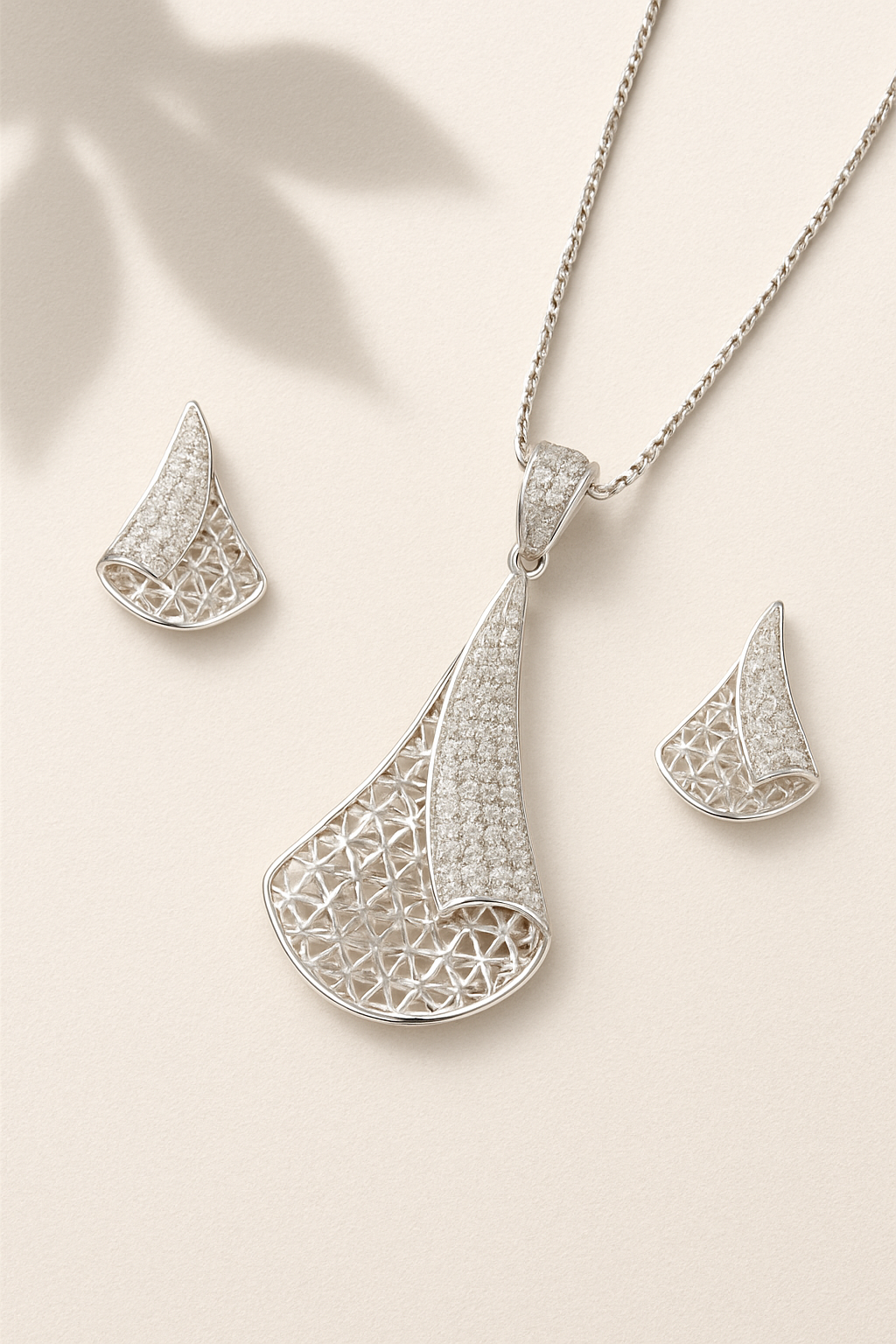Modern Twisted Diamond Earrings And Pendant Set